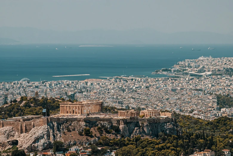 a large building that is next to a hill