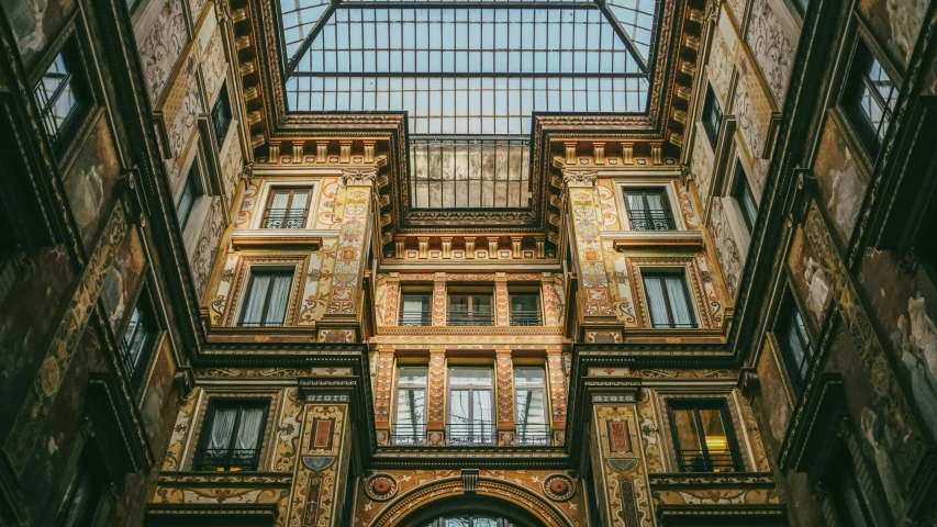 an overhead view of an old building with a glass ceiling