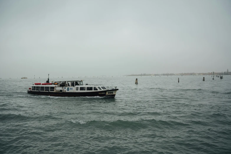 a boat traveling down a large body of water