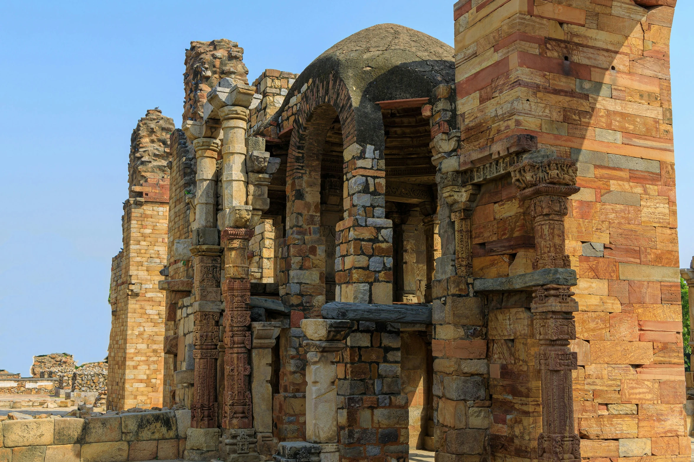 the ruins and doorways of an ancient building