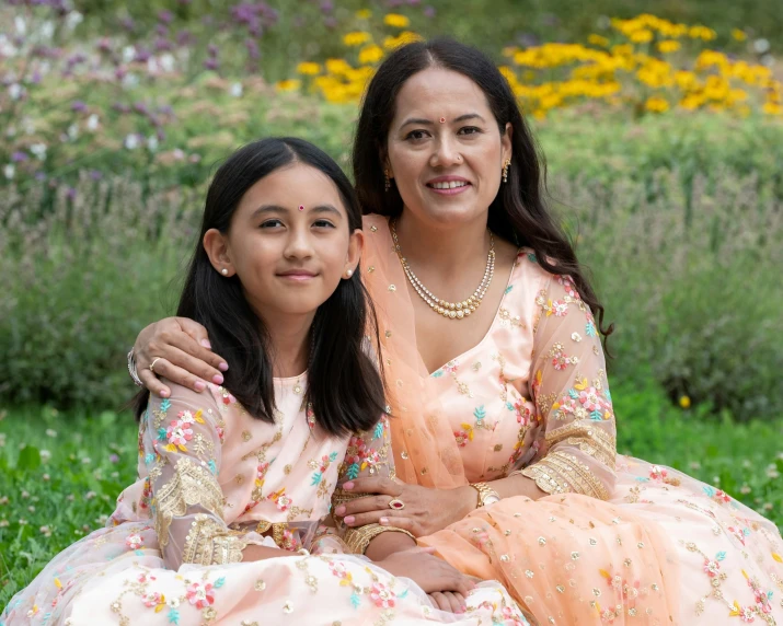 an image of two women that are sitting together