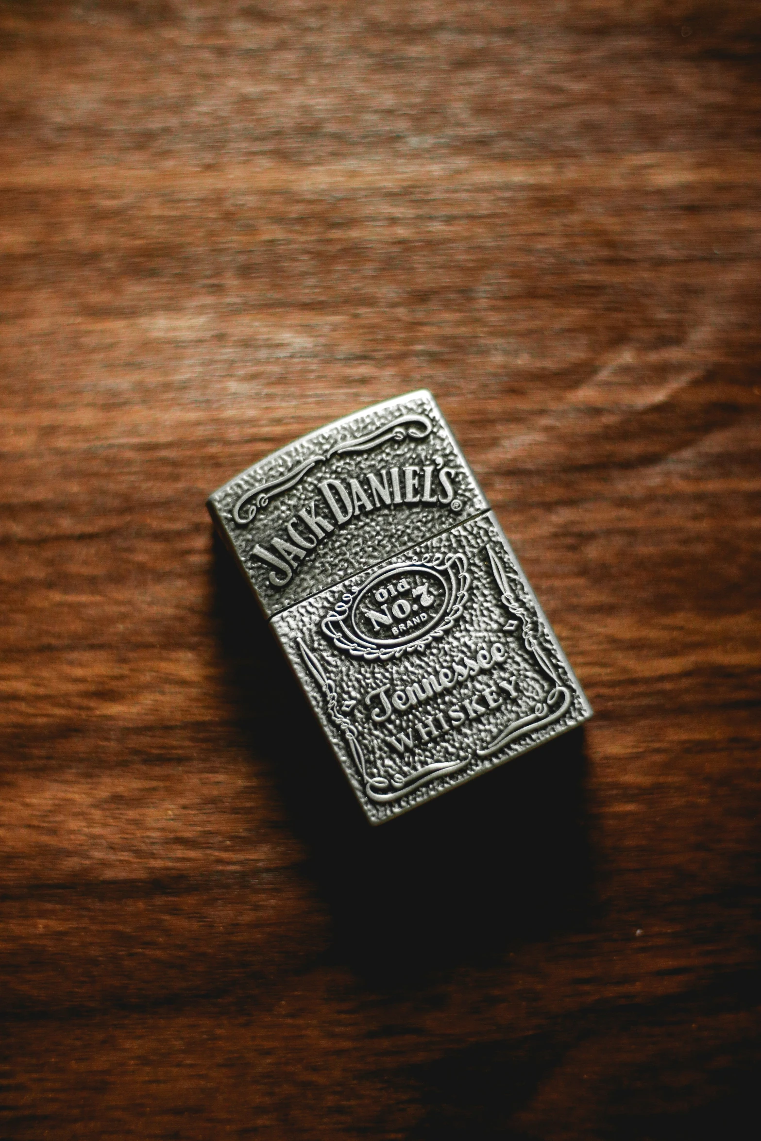 a wooden surface with a playing card on top of it