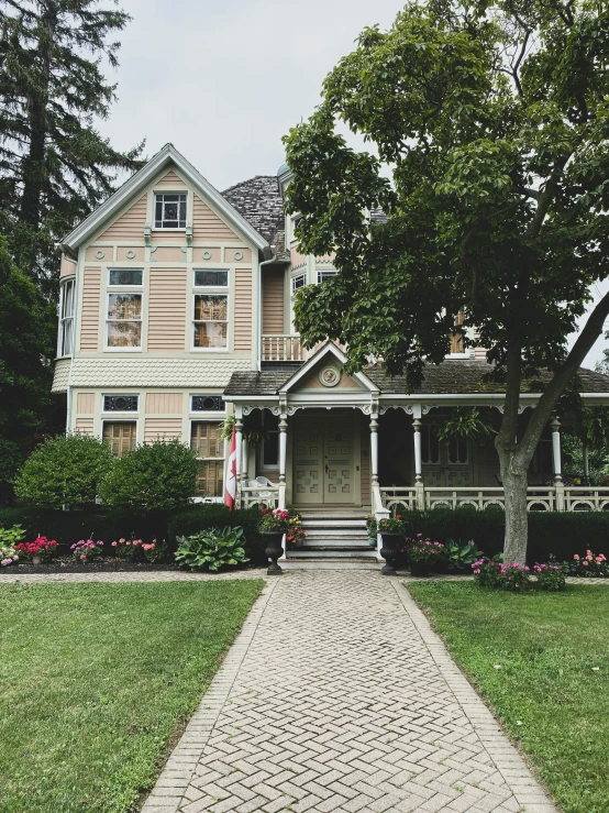 the house is large and a few trees