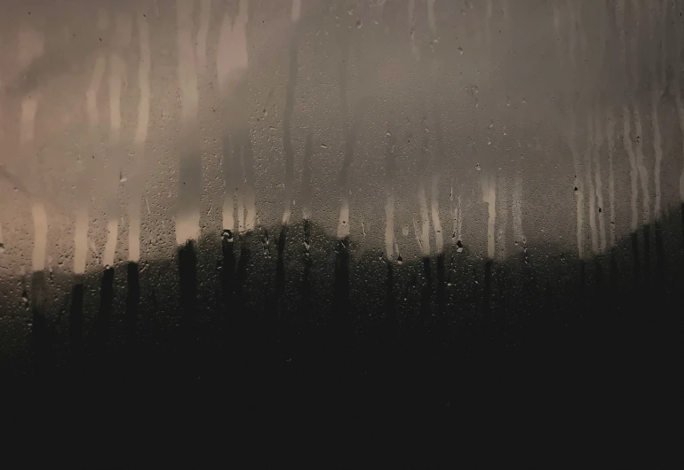 rain drops sitting on top of a window