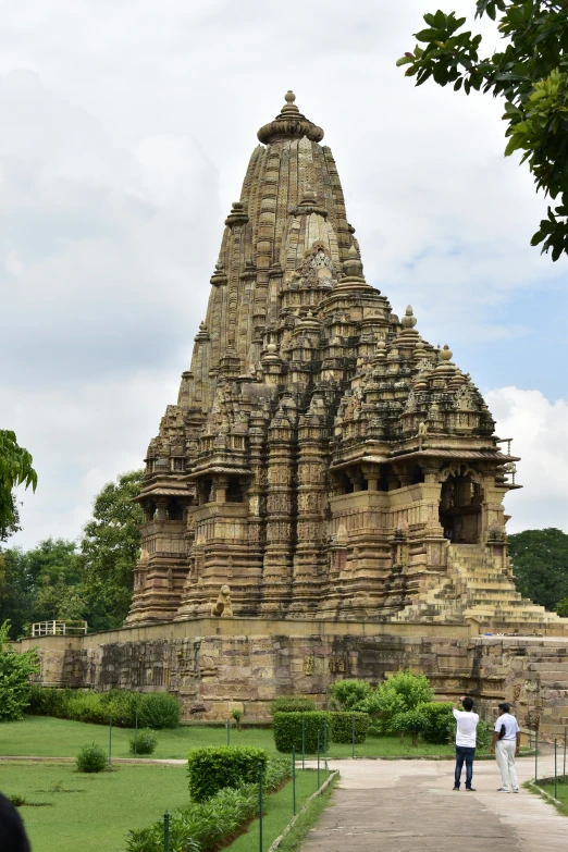 there is a very large stone building in the middle of a park