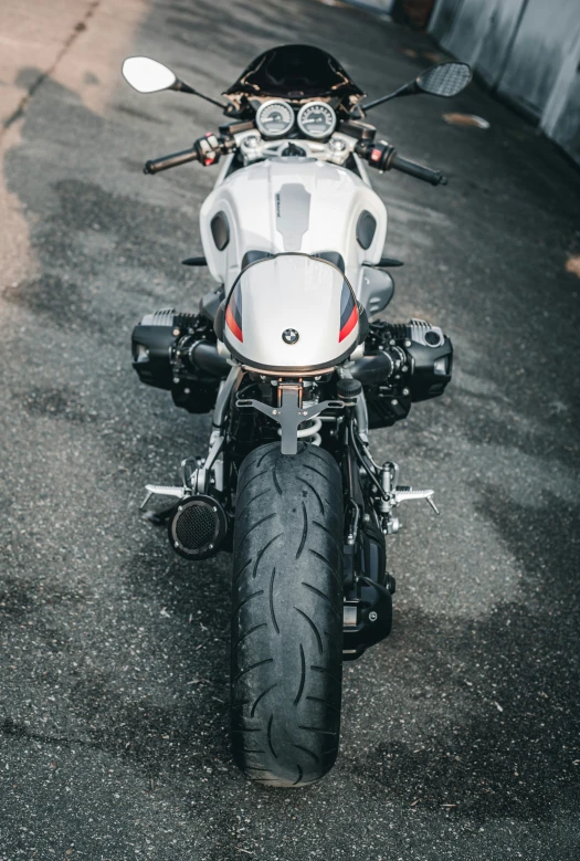 a white motorcycle parked in a parking lot