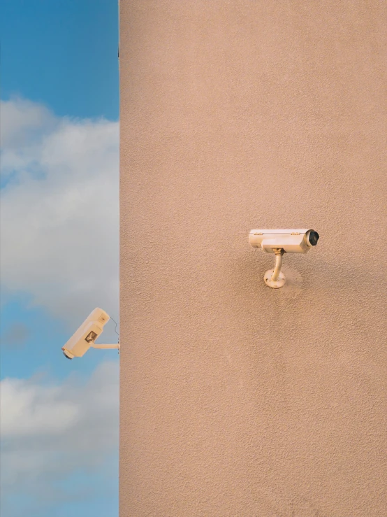 a camera that is sitting up against a building