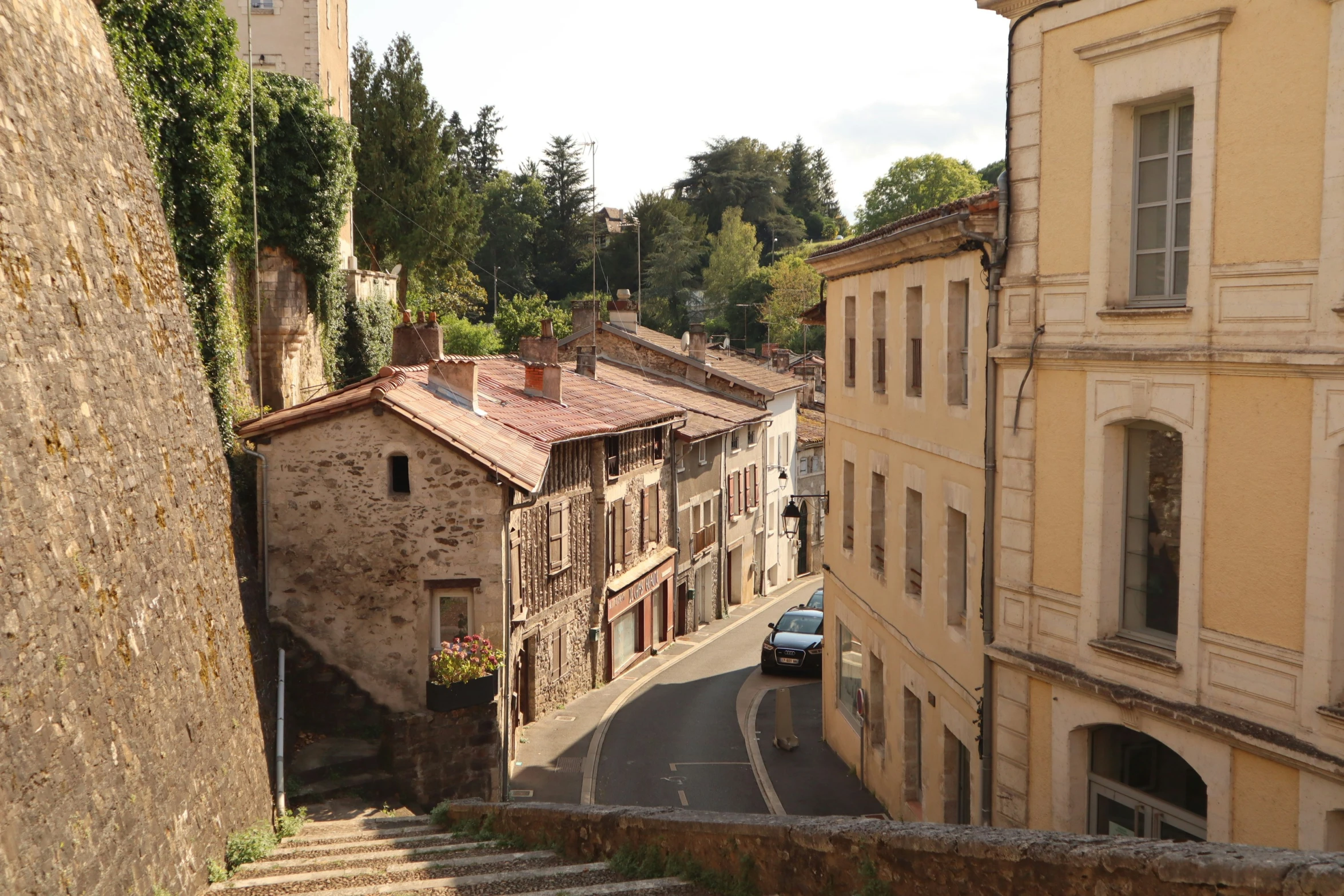 an image of a winding stone road in italy