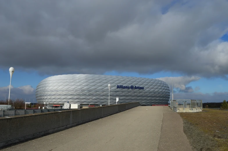 a large building with lots of metal in the background