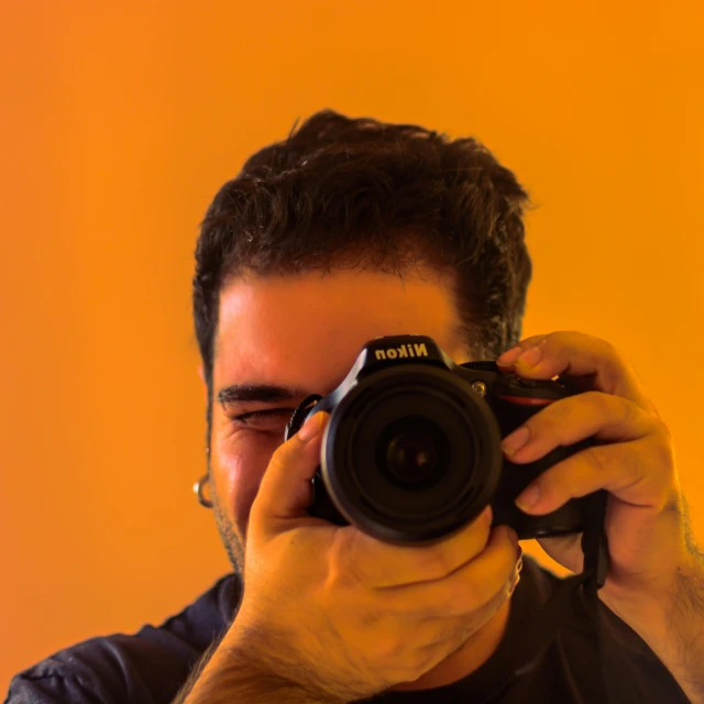 a man taking a picture with his camera