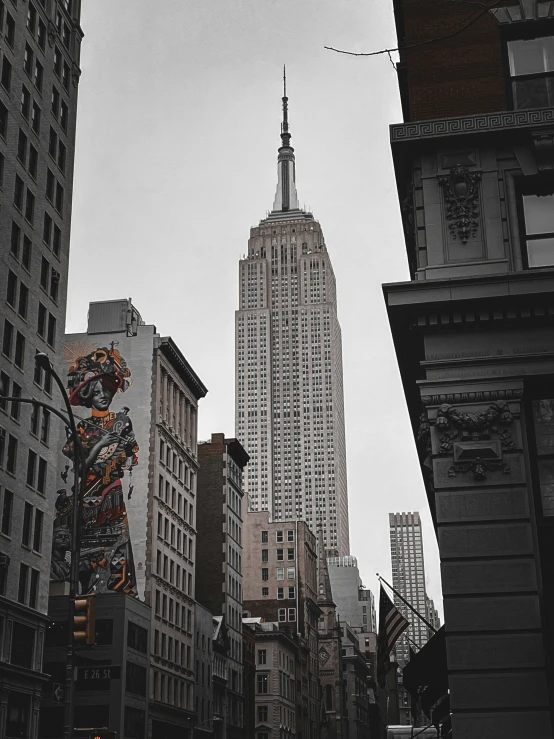 a view of an urban street looking up the buildings