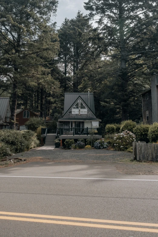 a stop sign is located in front of a house