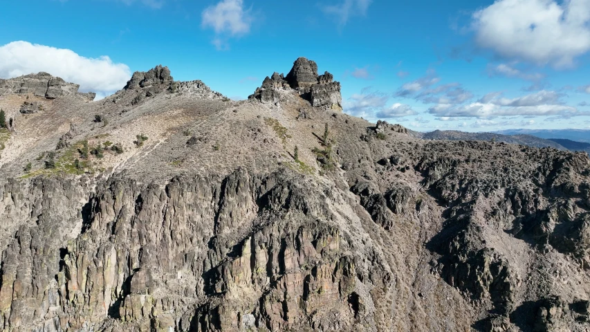 the top of a mountain with many different vegetation