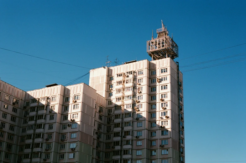 large building with large windows on both sides of the front