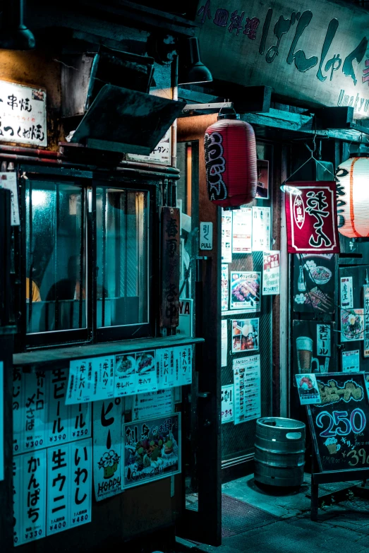 a restaurant with oriental food and lights at night