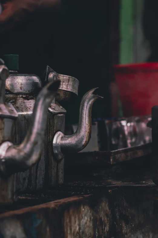 a closeup view of a metal container with two metal pieces attached