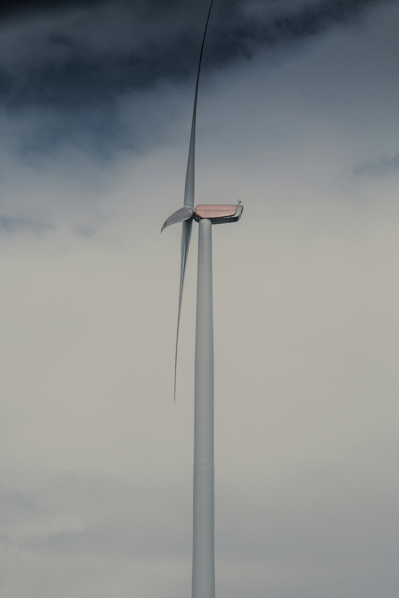 the aerial view shows a metal pole with a bird on top