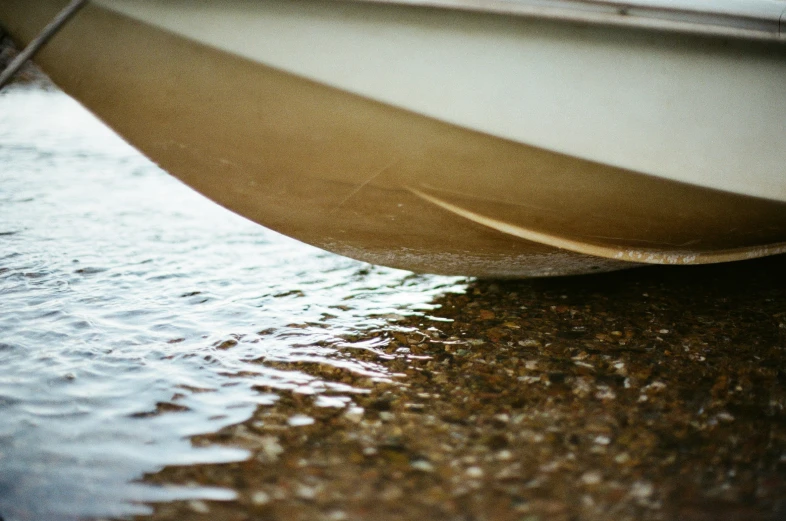 a boat and some water sitting near each other