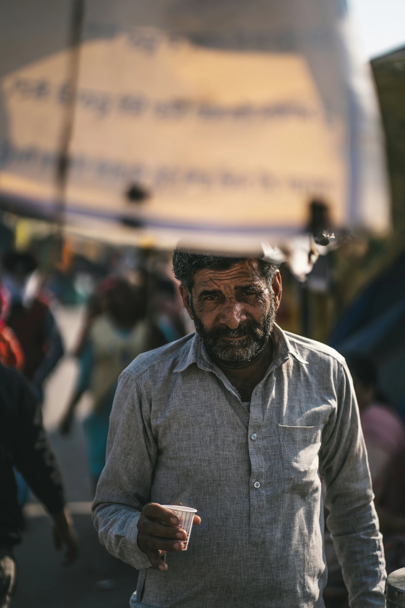 a man is walking on a busy street