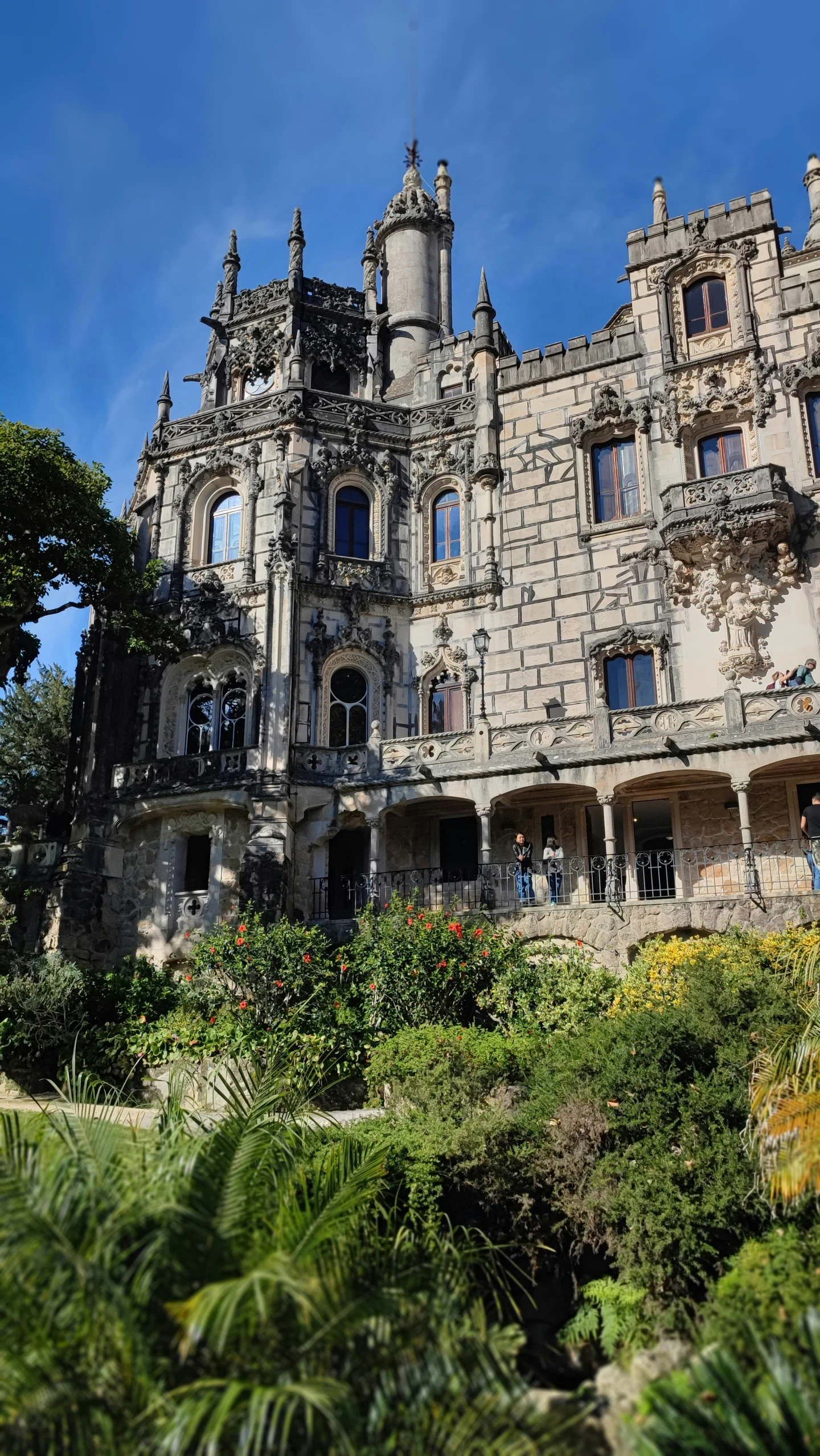 an old castle with towers on a sunny day