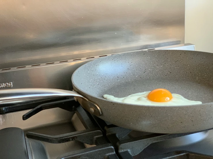 an egg that is fried in a pan