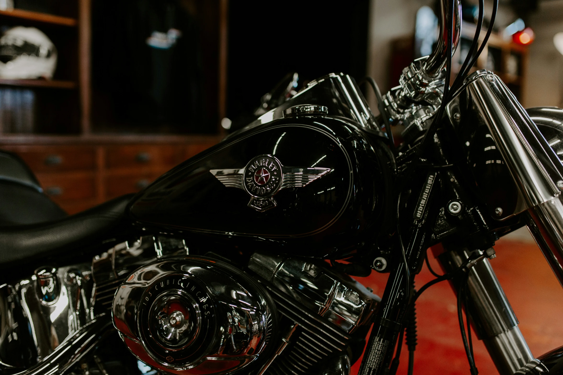 close up of a motor bike with a dark background