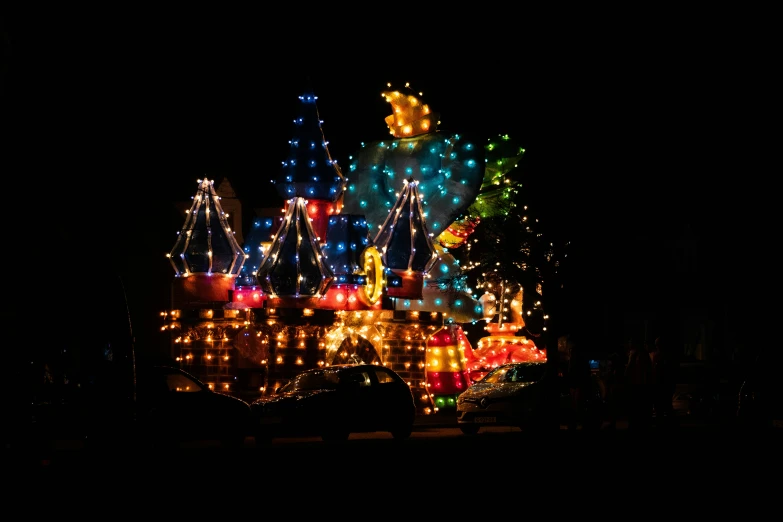 several lit up holiday lights in the dark