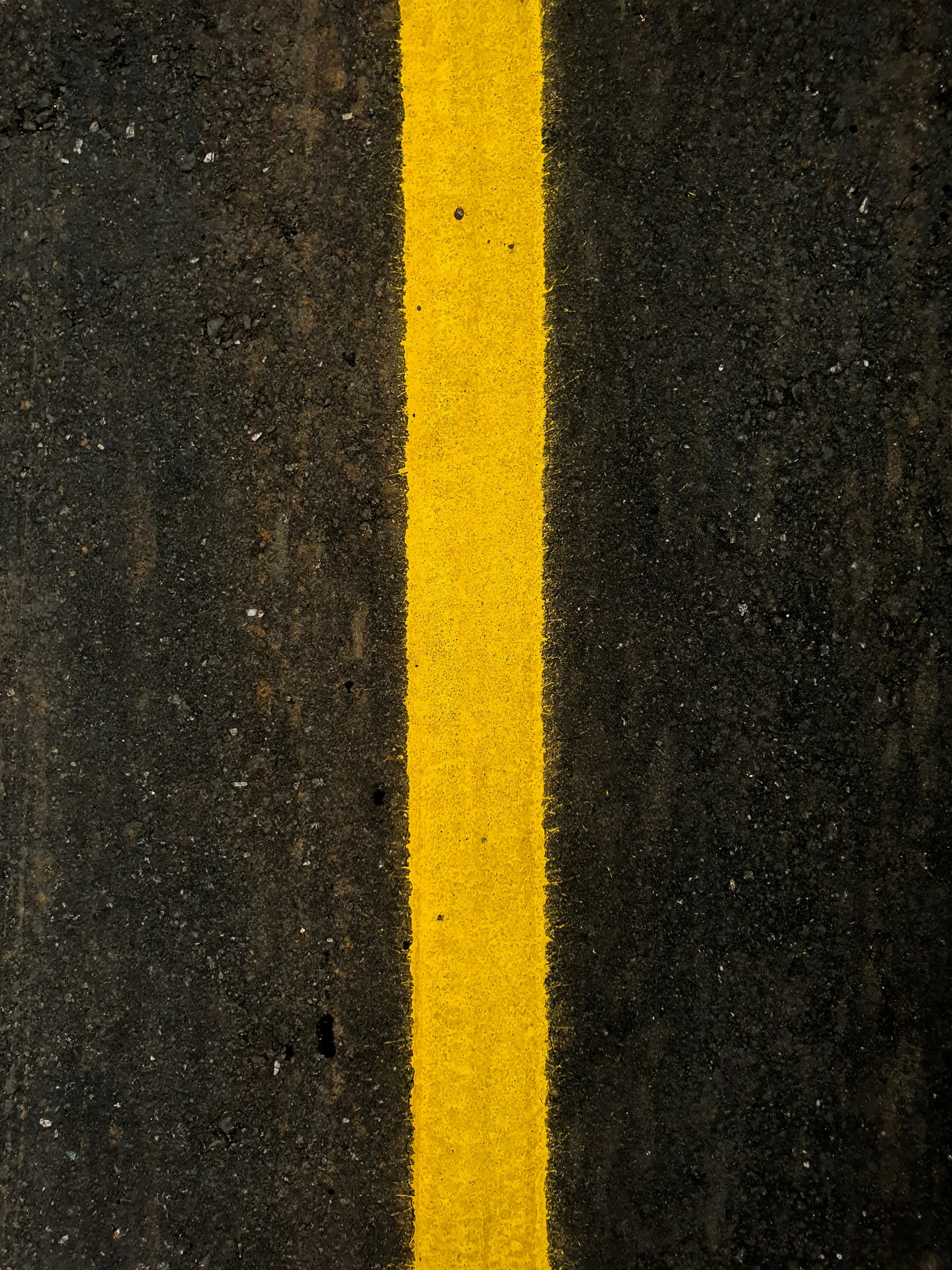 the road is black and yellow as if it were asphalt