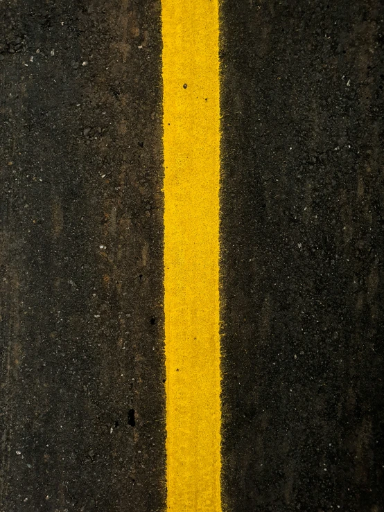 the road is black and yellow as if it were asphalt