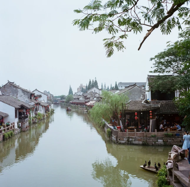 the water of the canal runs into houses