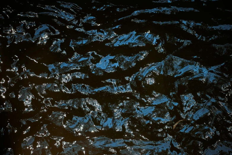 abstract pograph of water that looks like blue ice