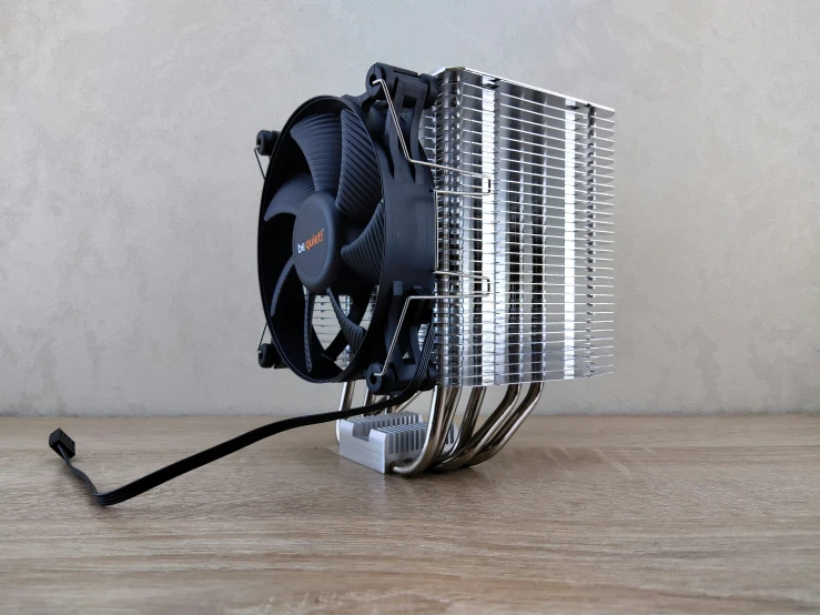 a computer cooling fan and radiator on a table