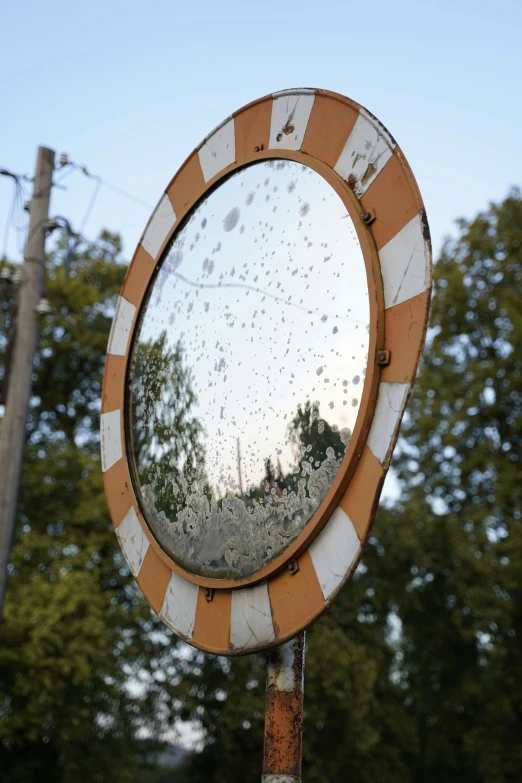 the mirror has been turned on by the street lamp