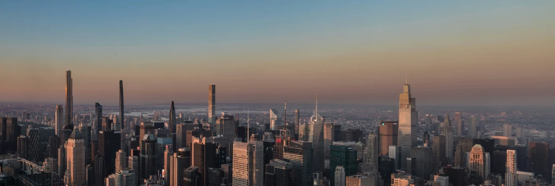 a very high view of an oriental city at sunset