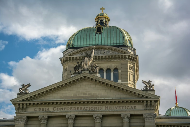 the top of a building with a dome on top