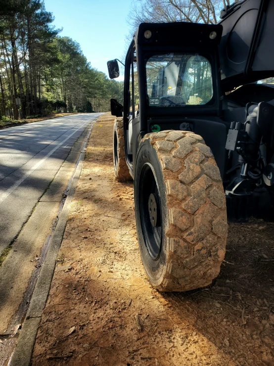 a big tractor moving some very short ground