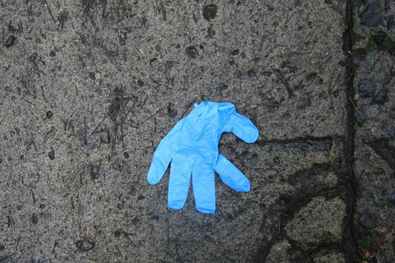 a glove is lying on the ground