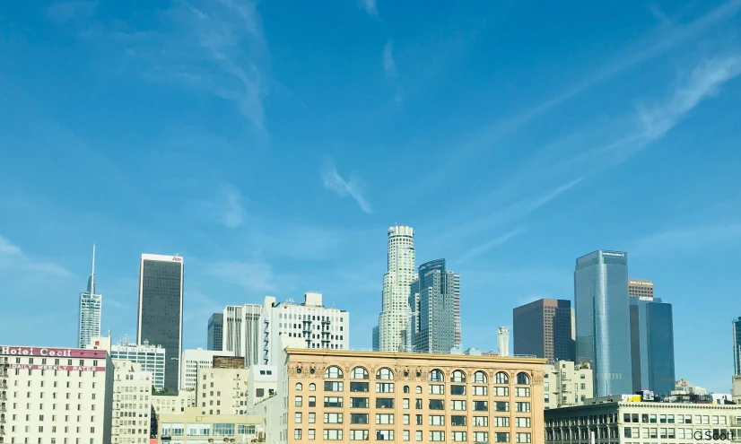 buildings are seen with a blue sky in the background