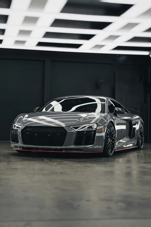 a audi sport car parked in a garage