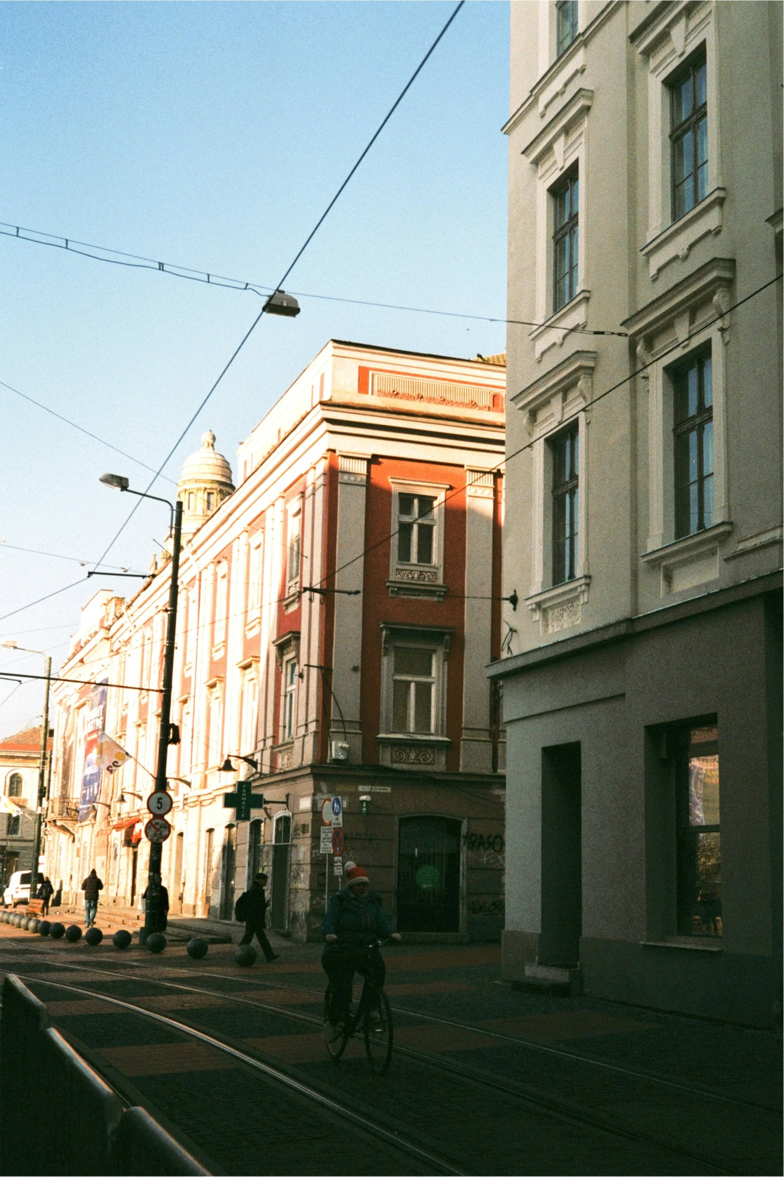 a person riding a bike on a street