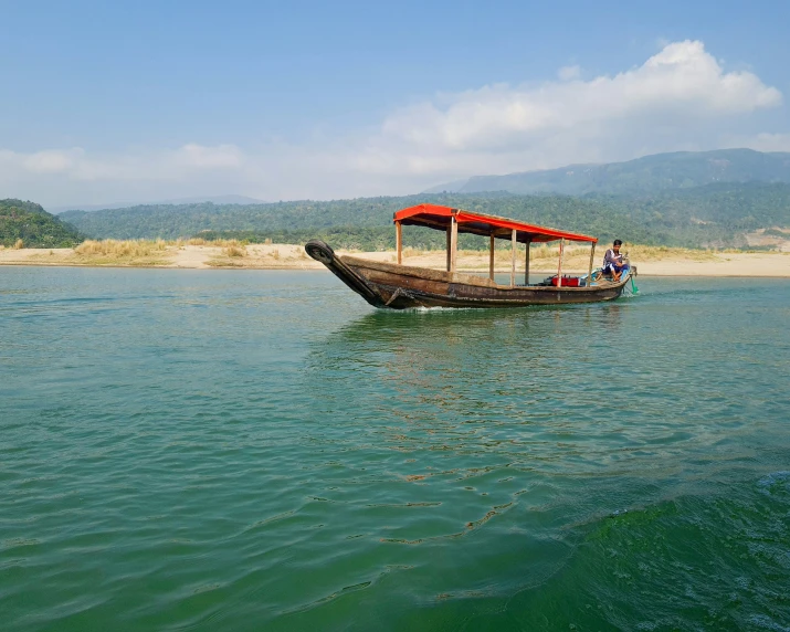 a boat that is floating in the middle of water