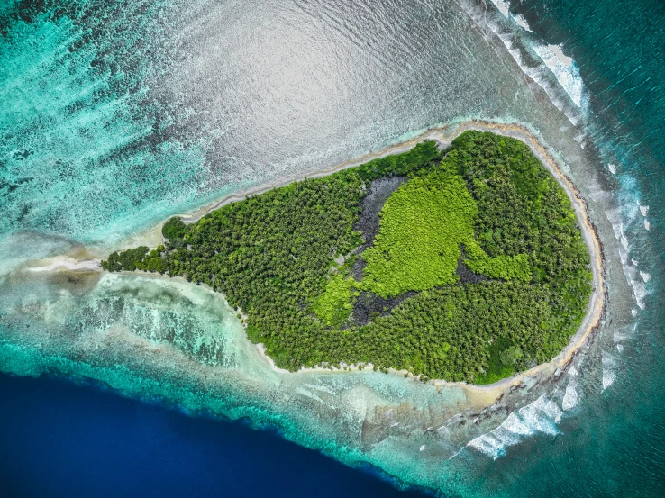 an island shaped by two water levels in the ocean