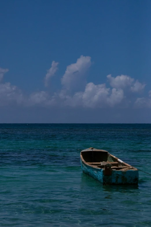 a boat is tied up in the ocean