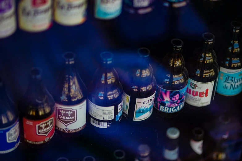 a display case filled with bottles of various kinds