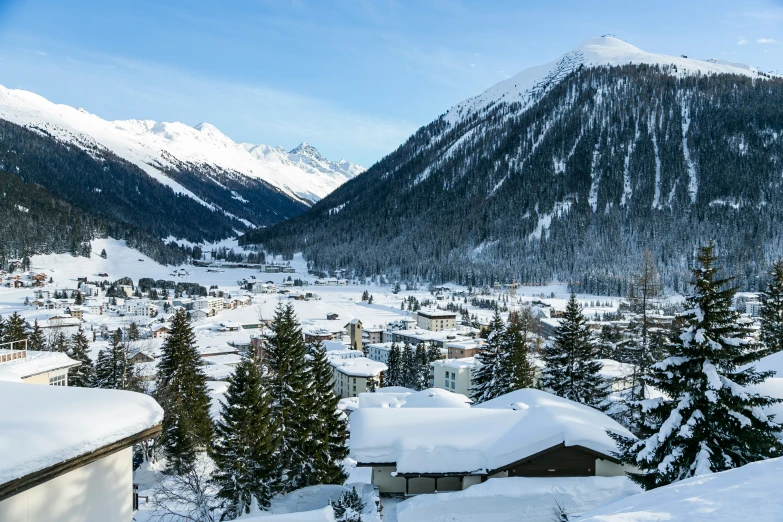 there is a snow covered mountain on the hillside