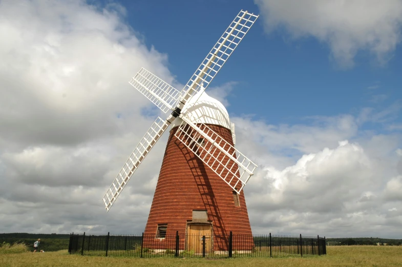 the windmill is built near a large gate