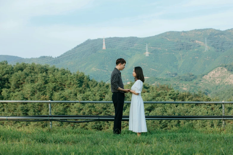 a couple on their wedding day gazing at the mountains