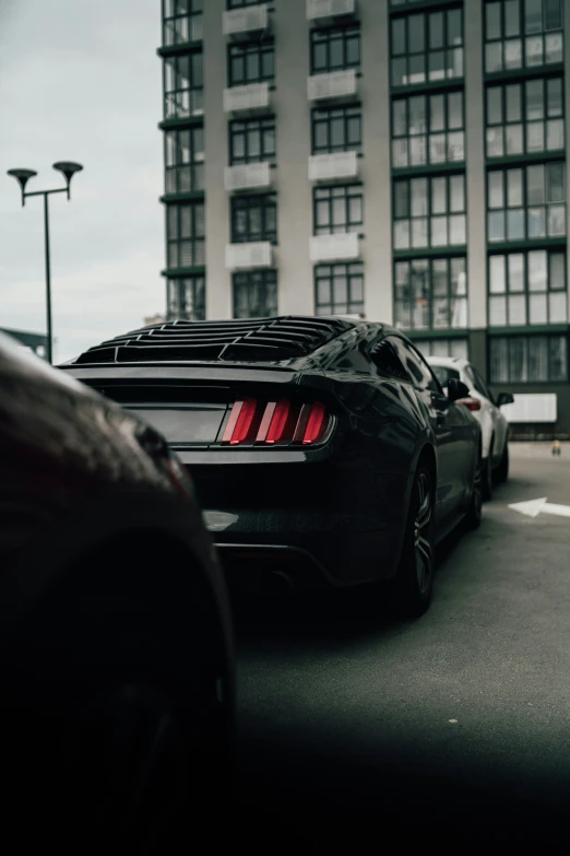 a close up s of a black car in a city