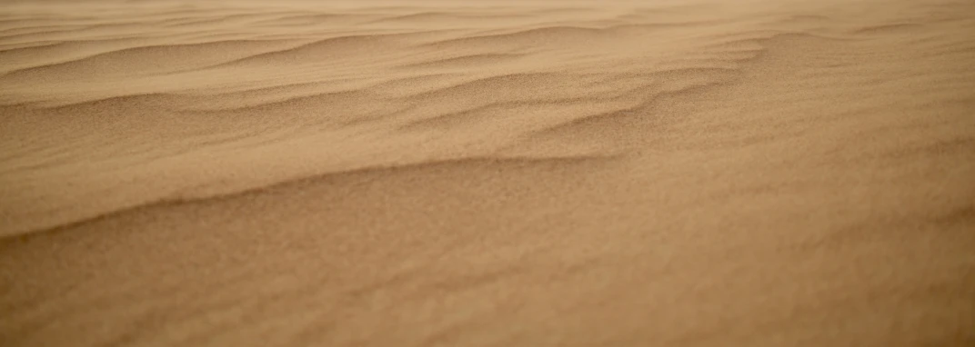 the brown sands of a desert area are very thin