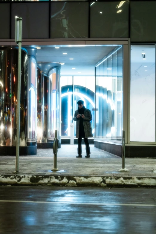 a person taking a picture of a tall building